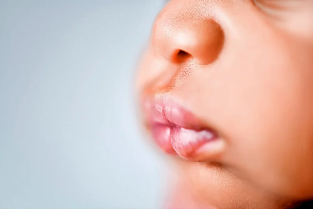 Newborn photography in Austin, Texas by Breeanna Rose Photography. Macro lips.