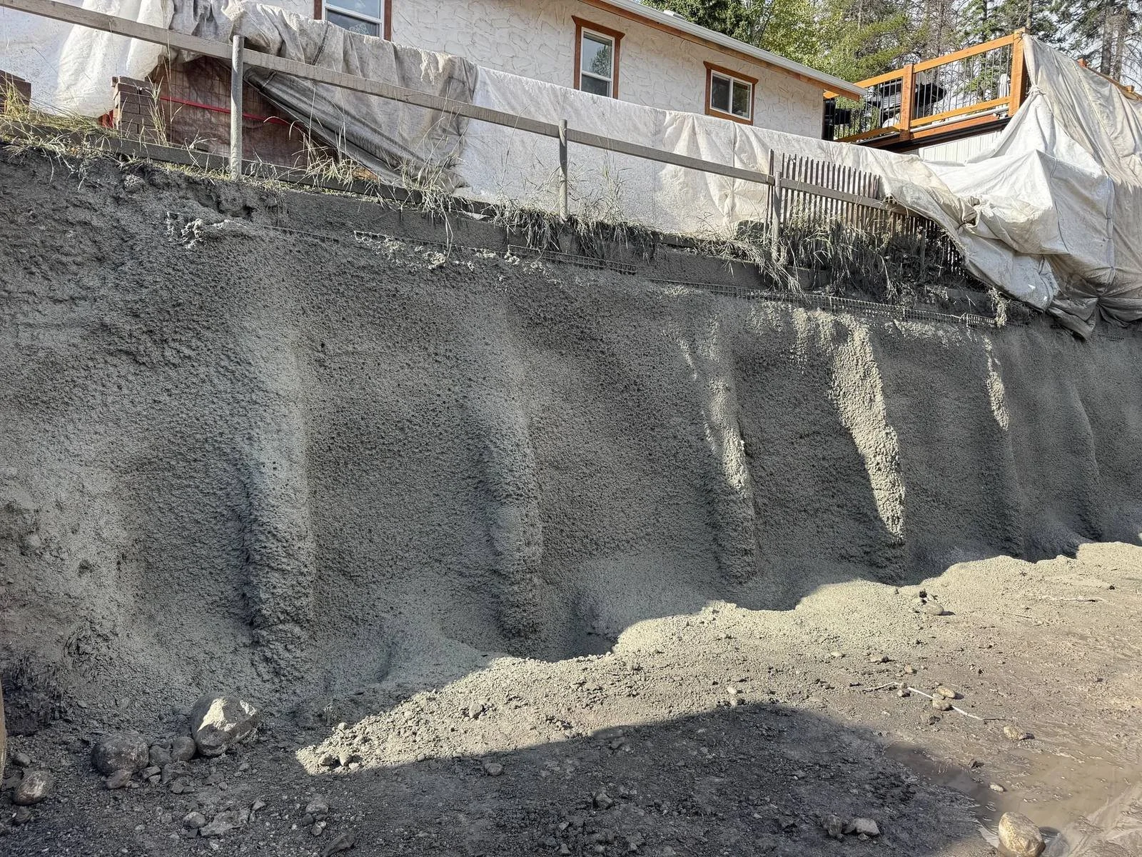 Engineered shotcrete wall with pilasters on a residential excavation, Alberta