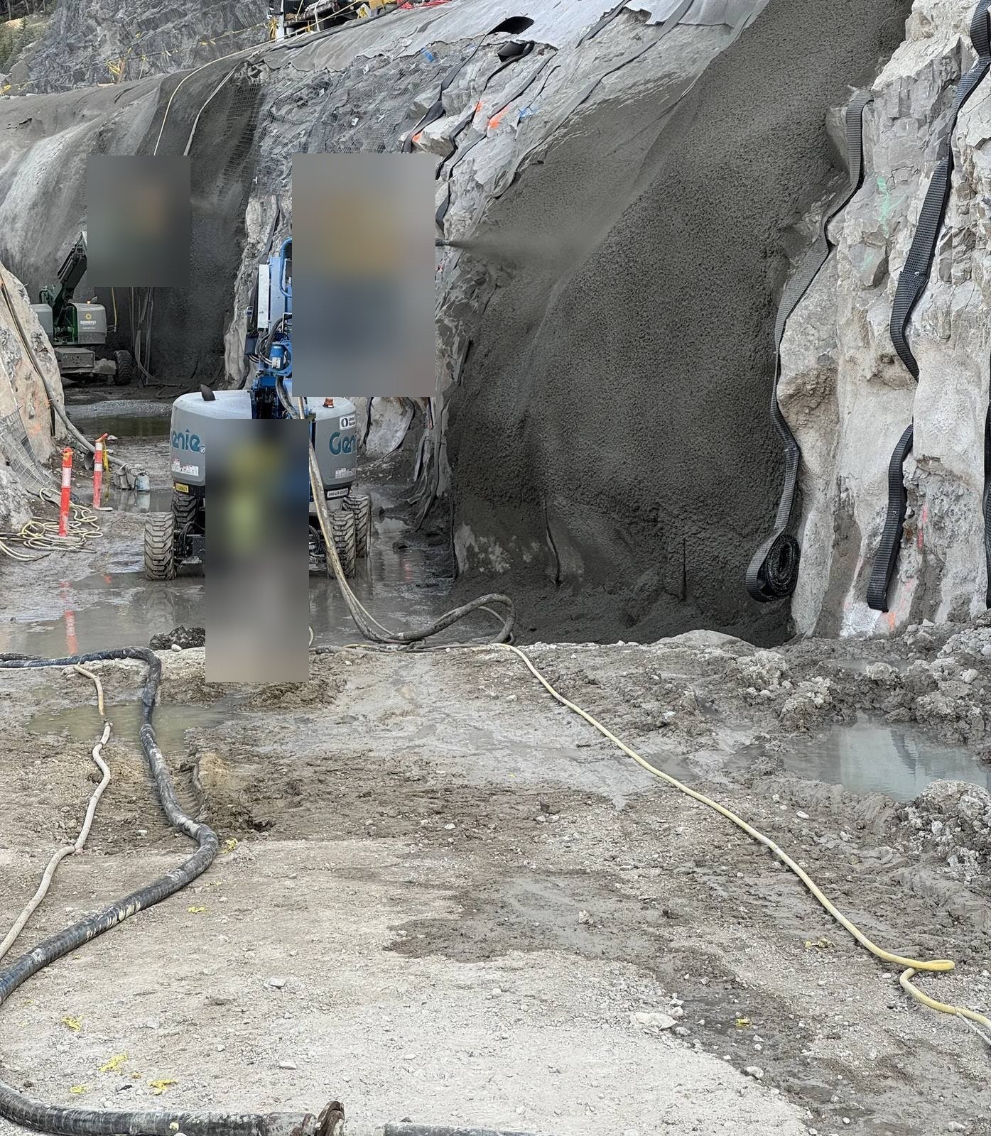 Shotcrete applied to a rock cut on a civil project