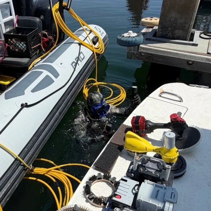 Miami motorboat underwater hull cleaning boat bottom diving algae and barnacles removal and anodes Zinc replacement. Soft brush, gentle cleaning non-abrasive.