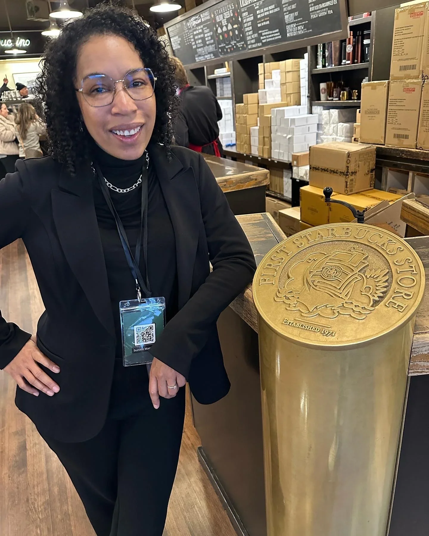 Shai Littlejohn on assignment inside the original Starbucks Coffee location in Seattle.