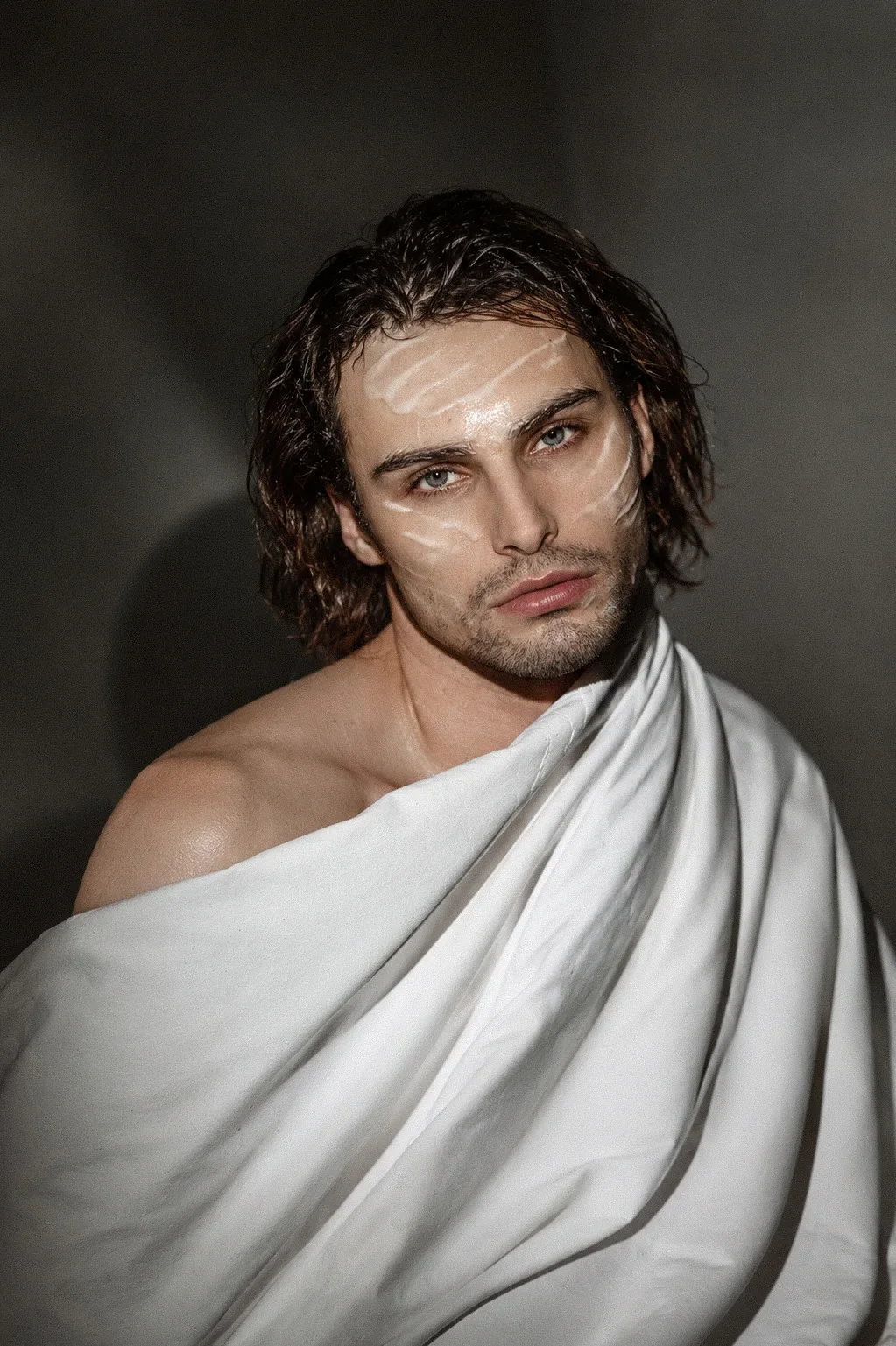 Konstantin Churakov — male fashion model represented by Noirvelle Models, featured in a creative editorial portrait.