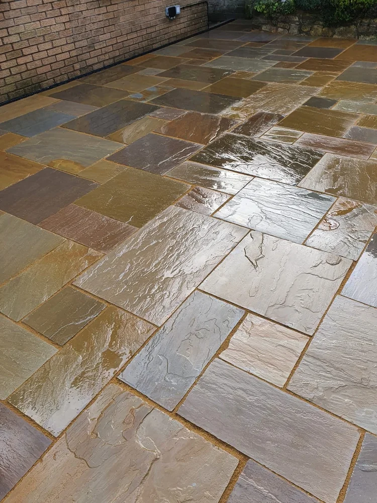Autumn-tone sandstone patio, washed down