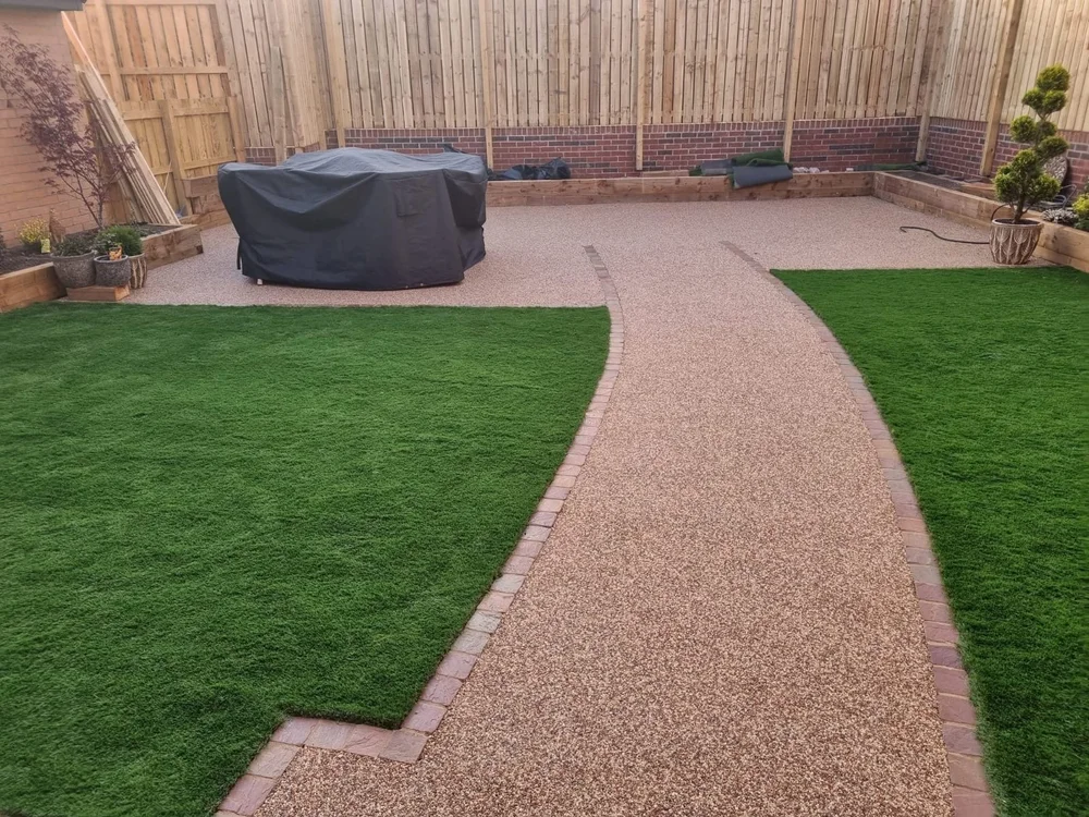 Curved resin path through the lawn