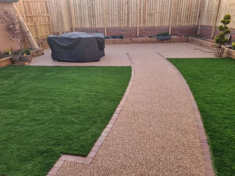Curved resin path through the lawn