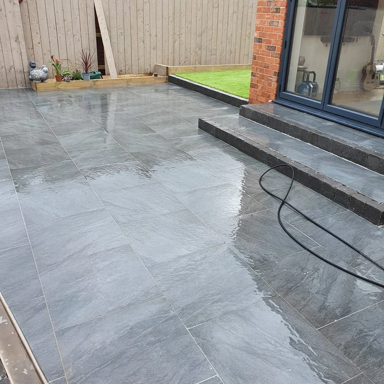Grey porcelain patio with double steps