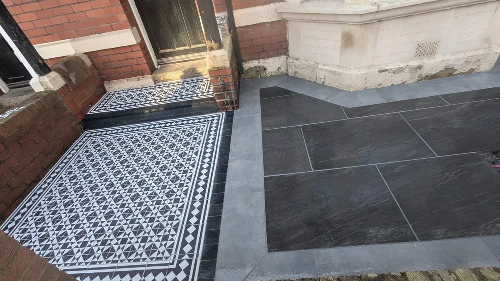 Victorian tiled entrance and dark slate path