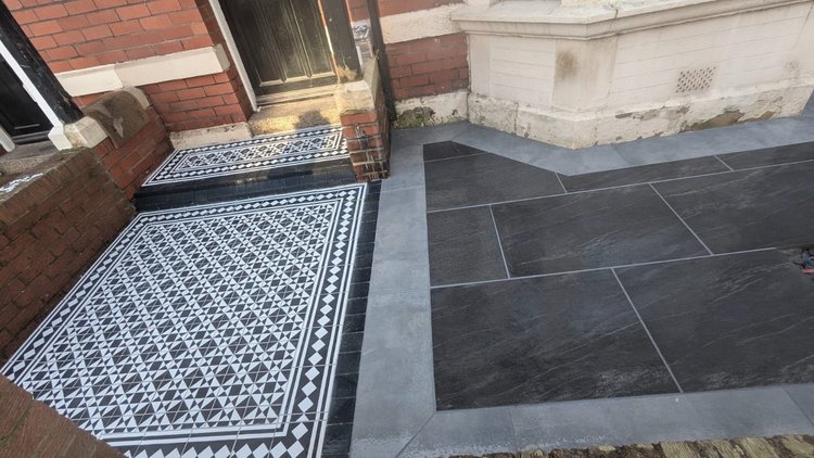Victorian tiled entrance and dark slate path