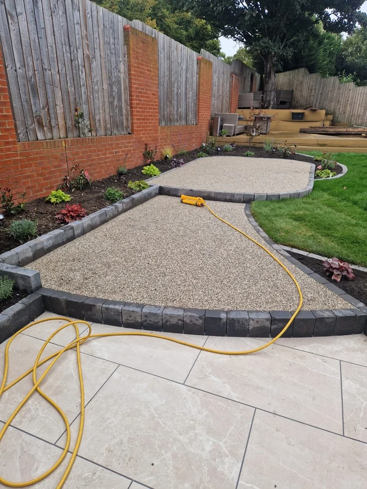 Resin paths edged in charcoal kerbs