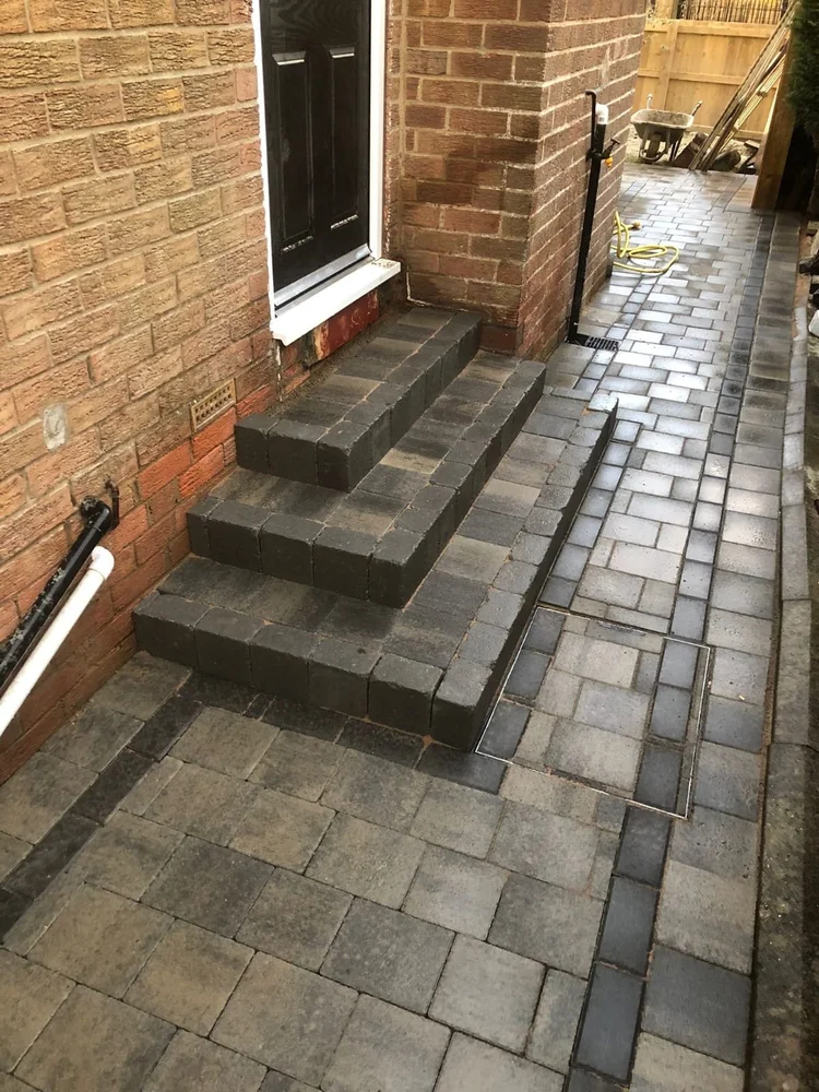 Block-paved side path with matching steps