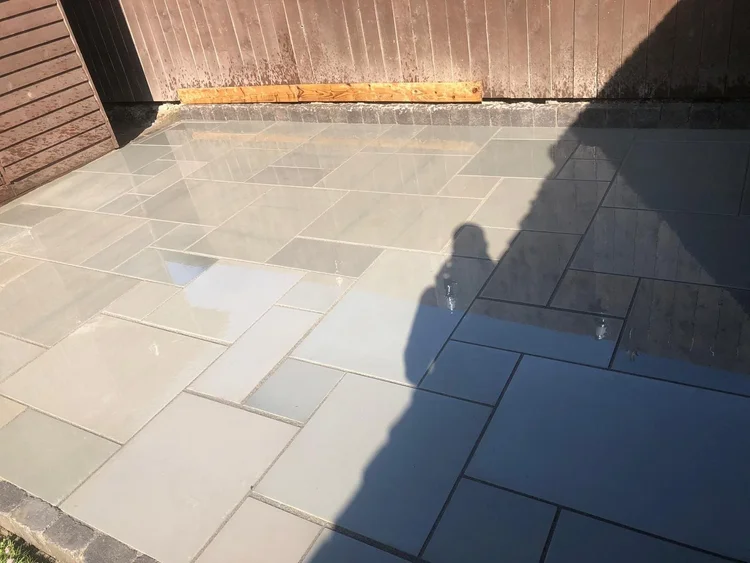 Pale sandstone patio in full sun
