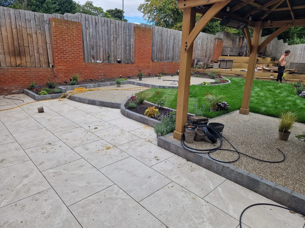 Garden makeover with a porcelain patio, gazebo and resin paths
