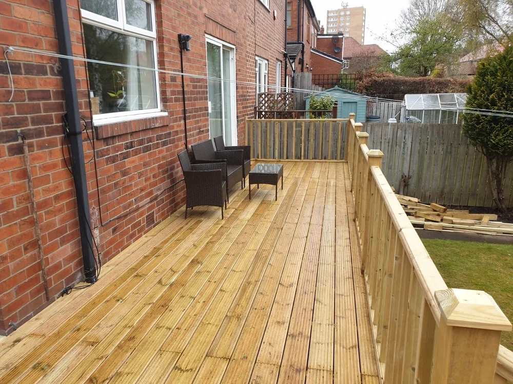 Timber decking with a handrail