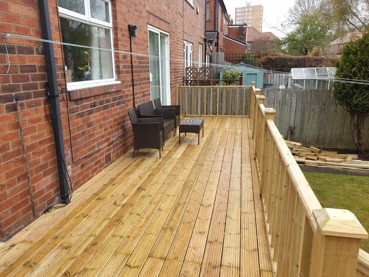 Timber decking with a handrail