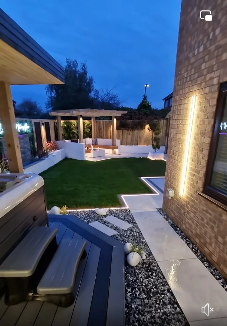 Modern garden with hot tub, lighting and gazebo