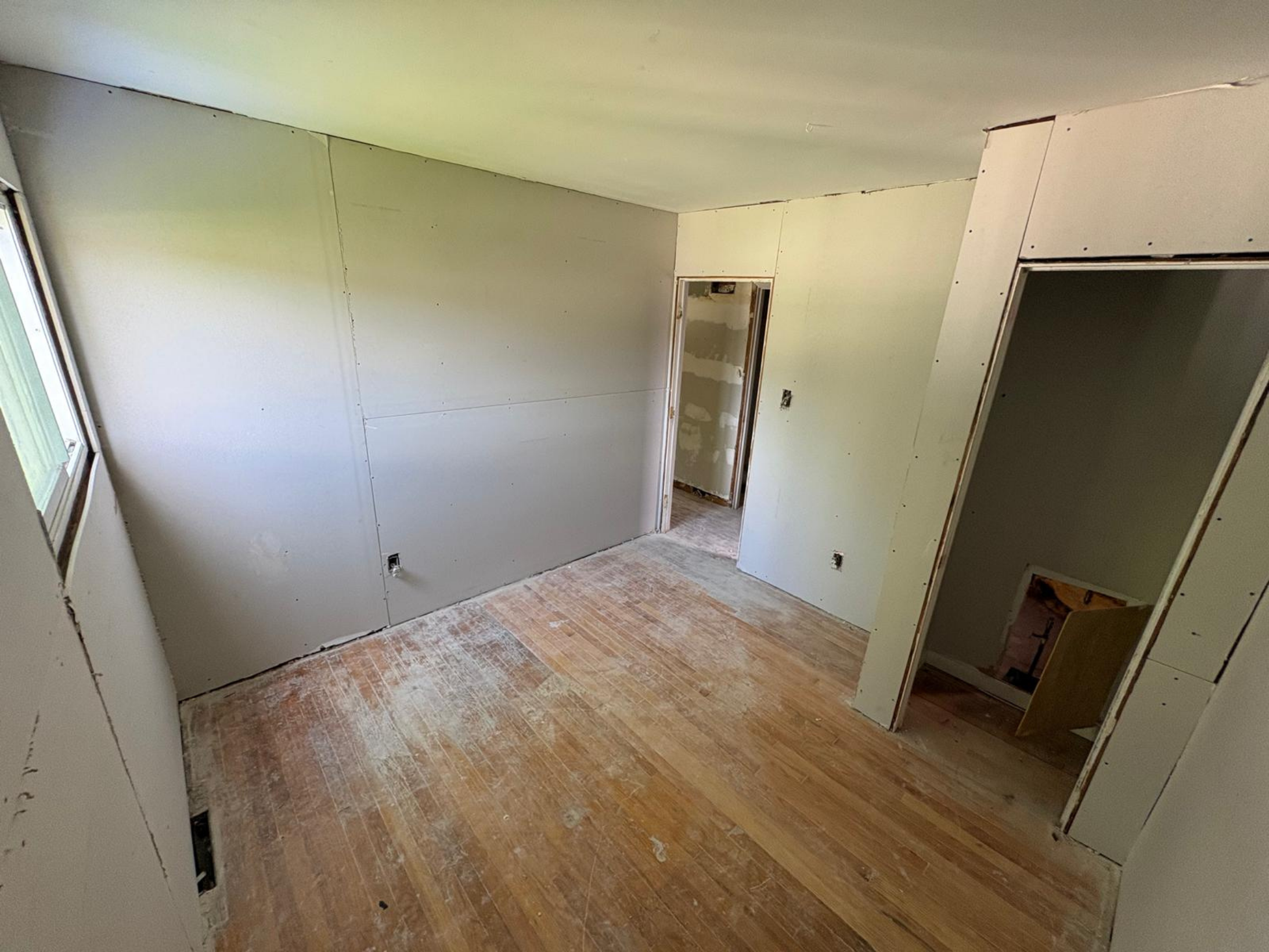 Moldy drywall removed and replaced with new drywall.