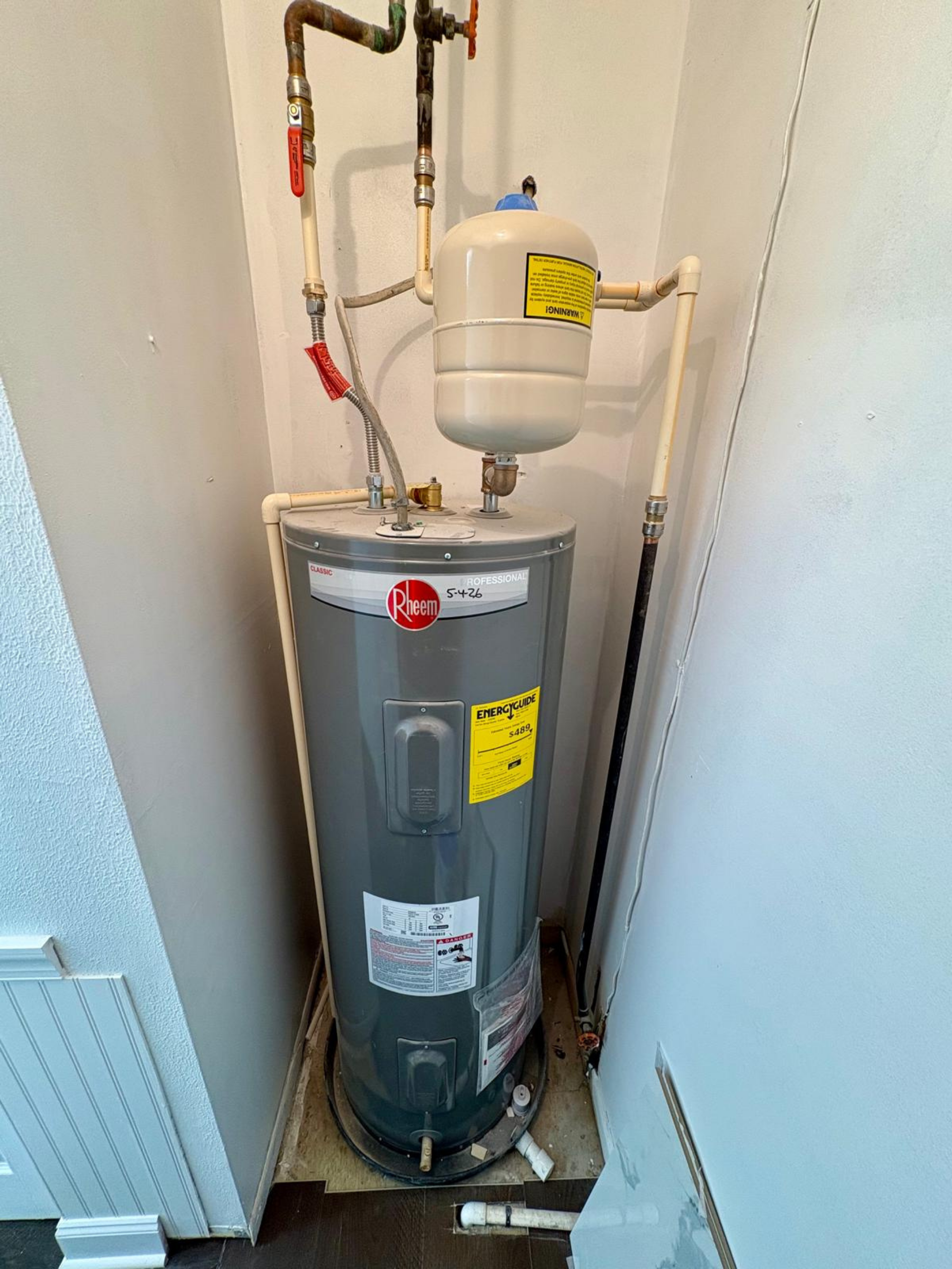 New 50-gallon electric water heater with expansion tank.