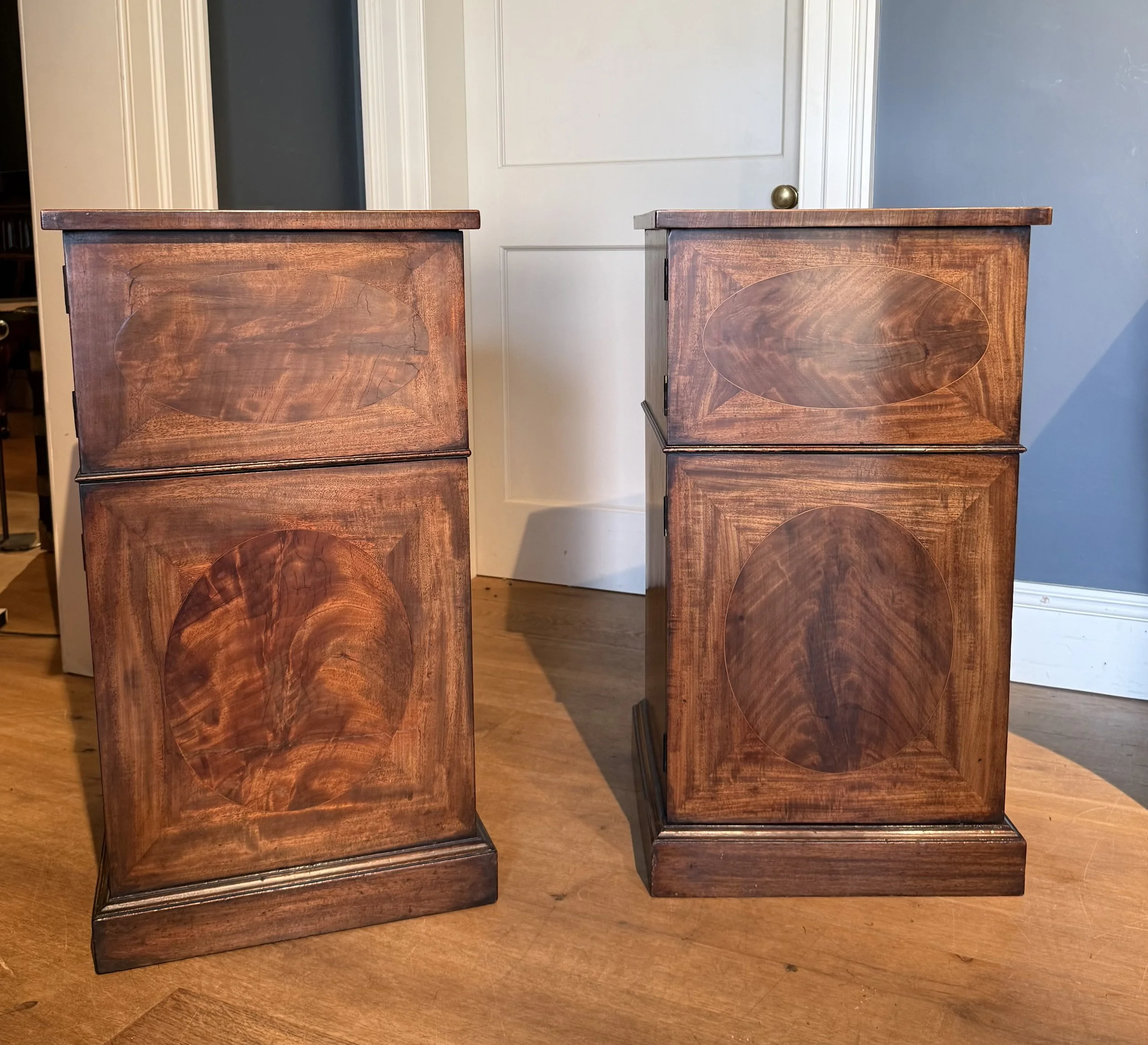 A pair of late 18th Century mahogany pedestals