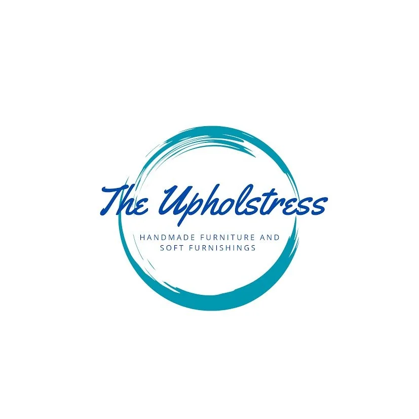 Logo for The Upholstess featuring a blue circular brushstroke and the business name in cursive, with the tagline "Handmade furniture and soft furnishings."