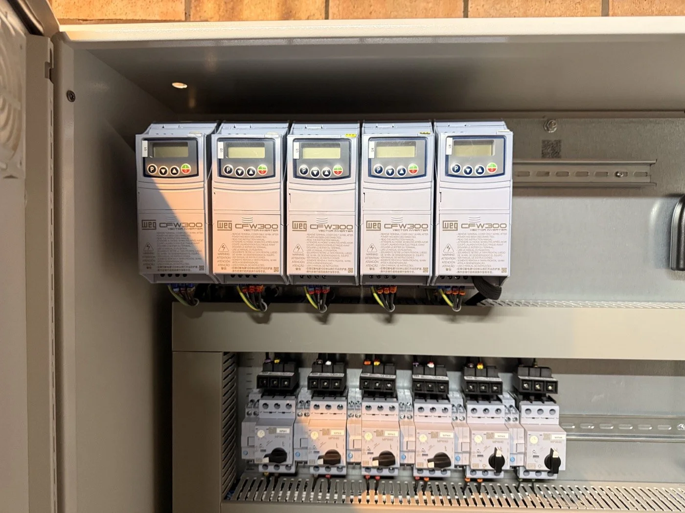 Drives and motor protection — component mounting and panel wiring.