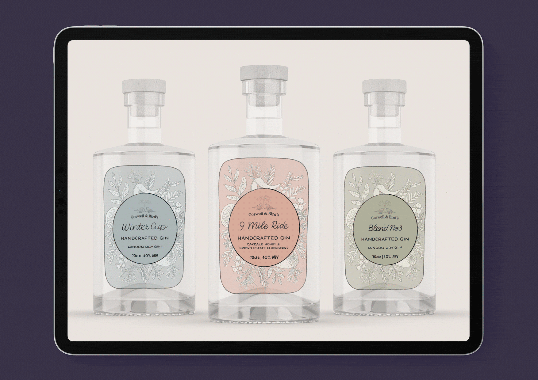 Display of three bottles of handwritten gin with floral labels, from left to right: Winter Cup, 9 Mile Ride, and Blend No.3, on a digital device screen.