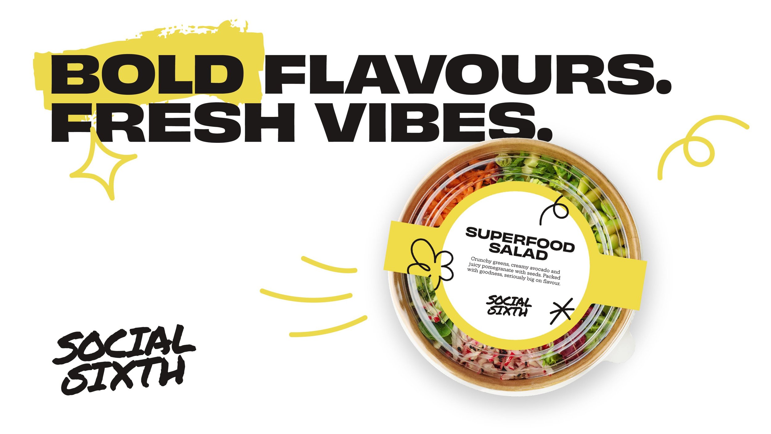 A clear plastic container of Superfood Salad with fresh greens, avocado, and tomatoes, labeled with a yellow sticker containing product description.
