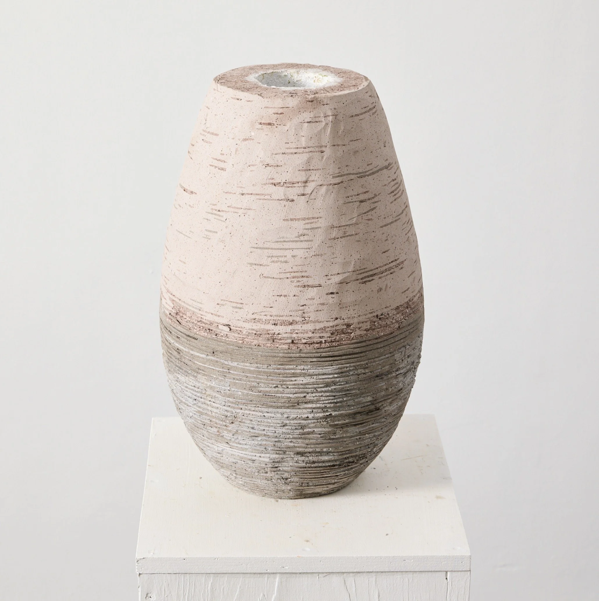 Inside Out (natural), 2025 volcanic stone (hollow) stone dust and acrylic 19 in high 35 lbs