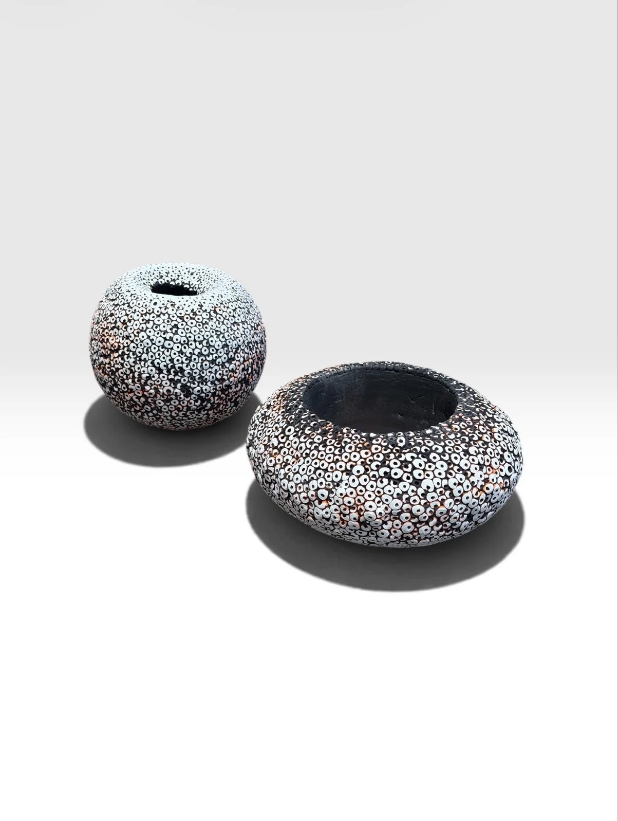 Inside Out (accreted), 2026 volcanic stone, stone dust, resin and pigment each approx. 9 in