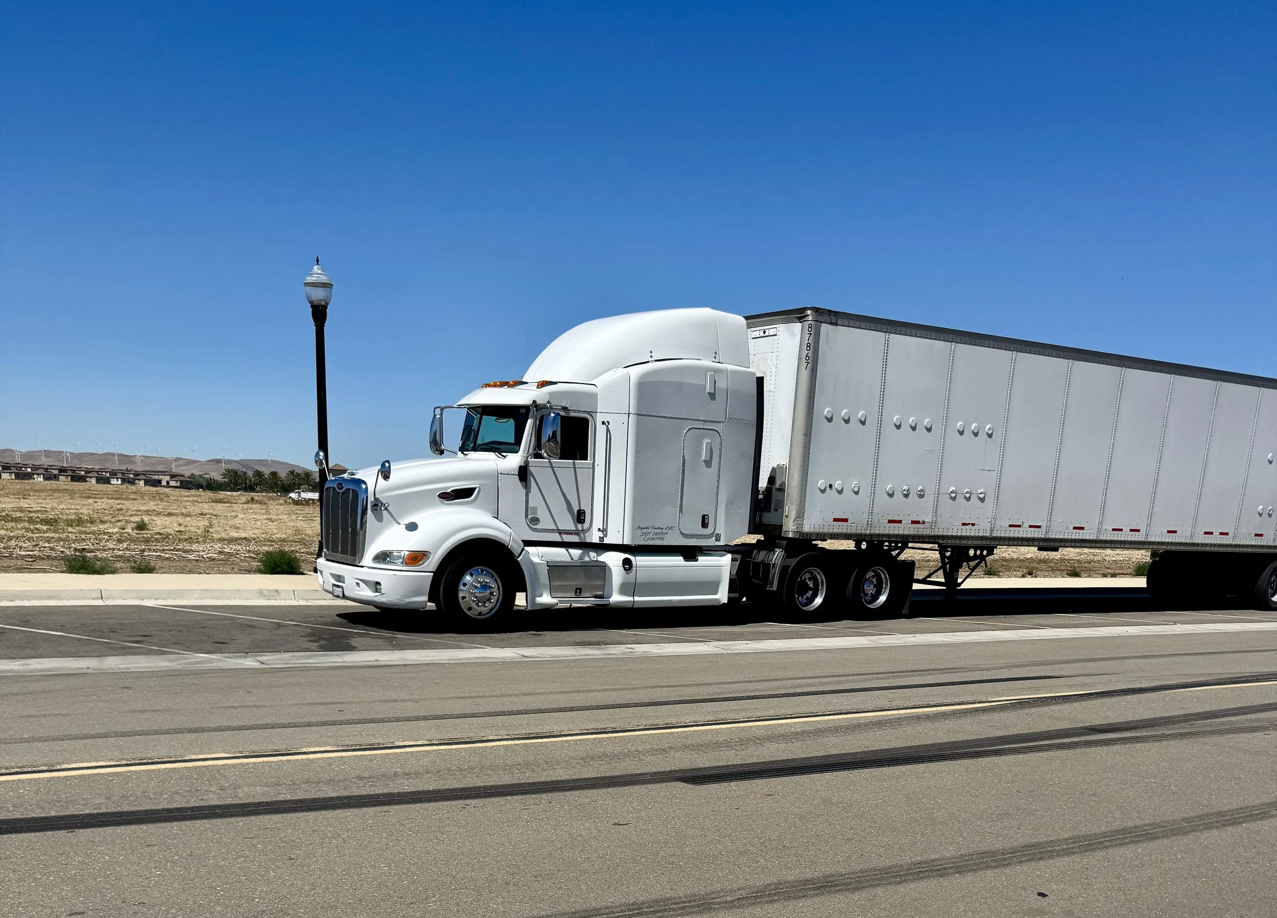 Arguello Trucking Peterbilt with a 53-foot dry van trailer in California.