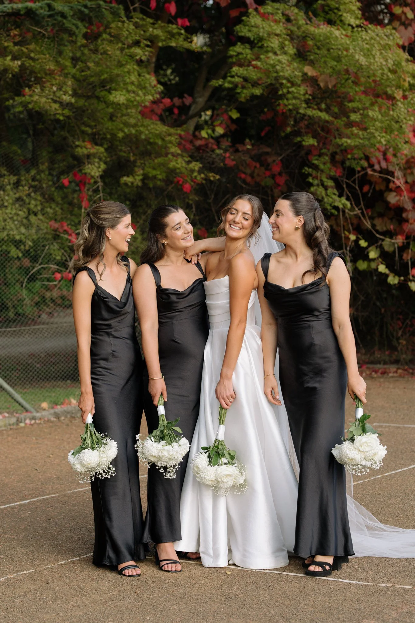 Bride and bridal party together at a Tasmanian wedding.