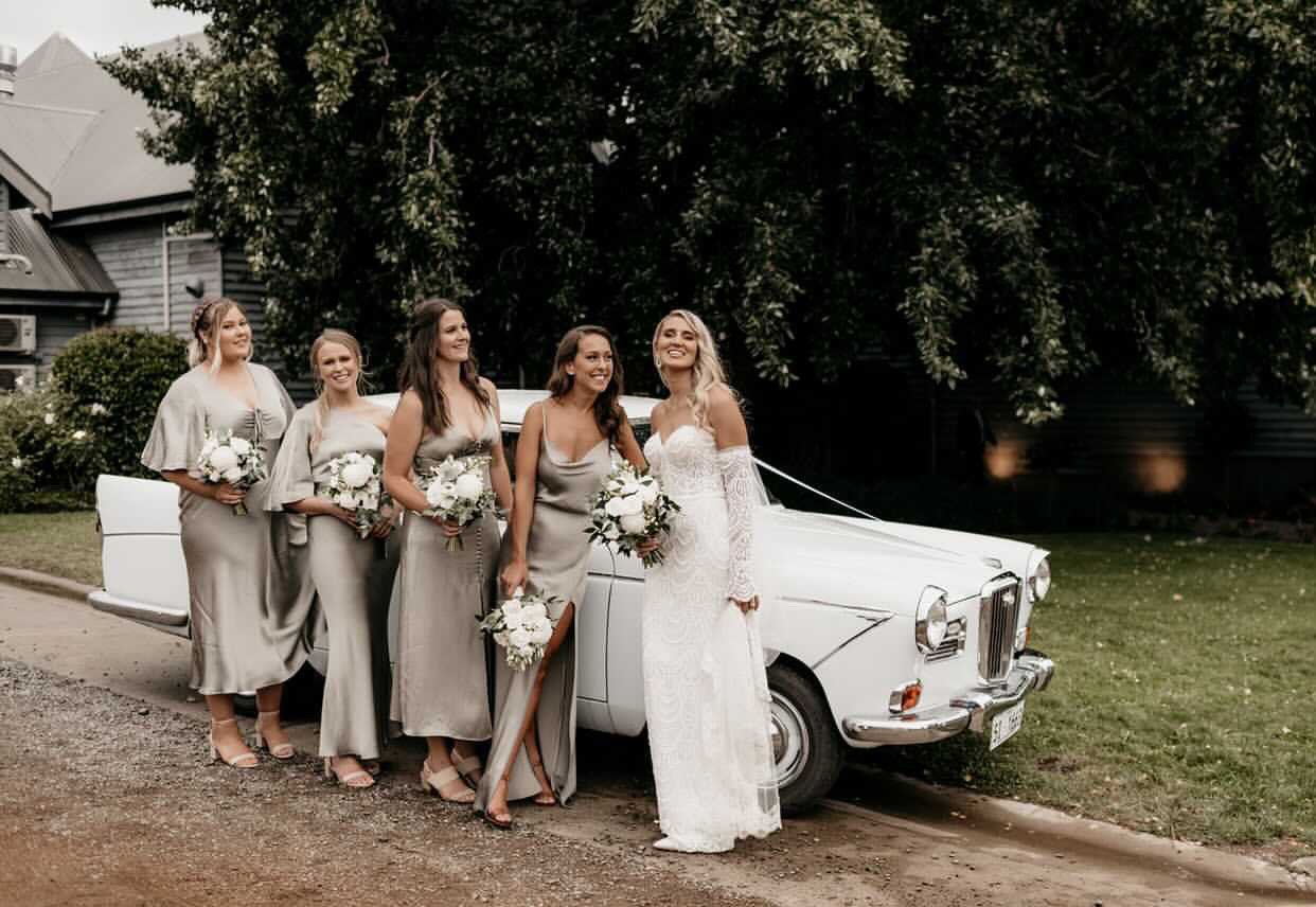 Bride and bridesmaids together on a Tasmanian wedding day.
