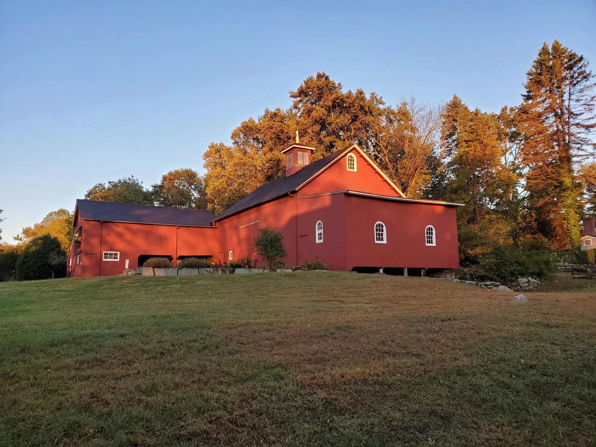 The 1883 Coley Barn in early morning light, fall 2020