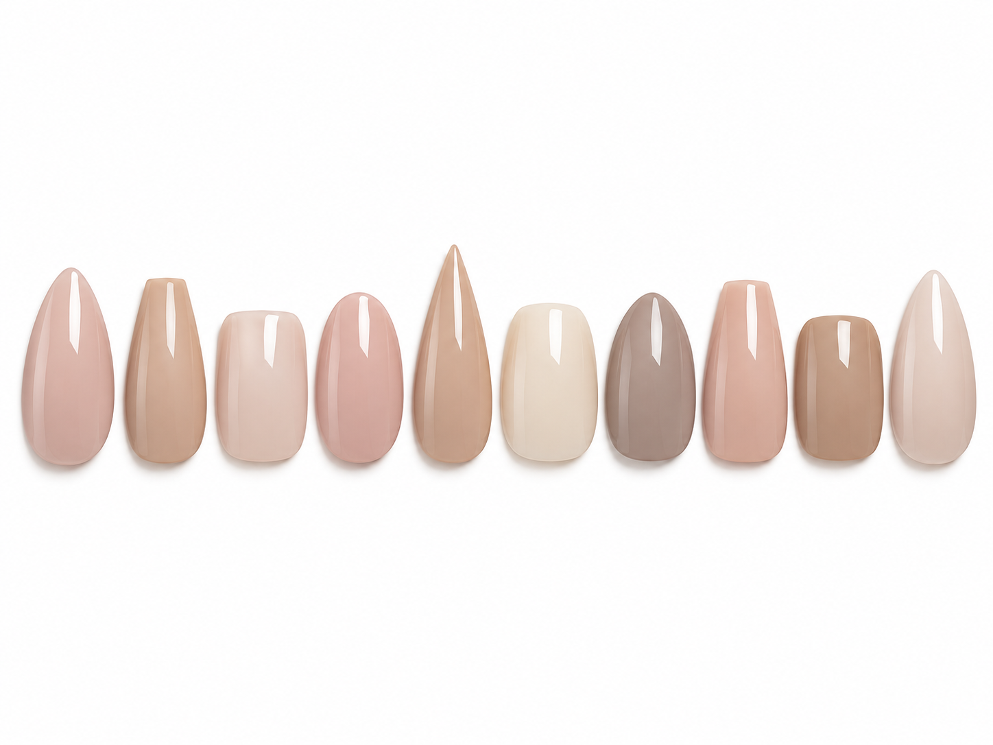 A lineup of ten artificial nails painted in various neutral and pastel shades.