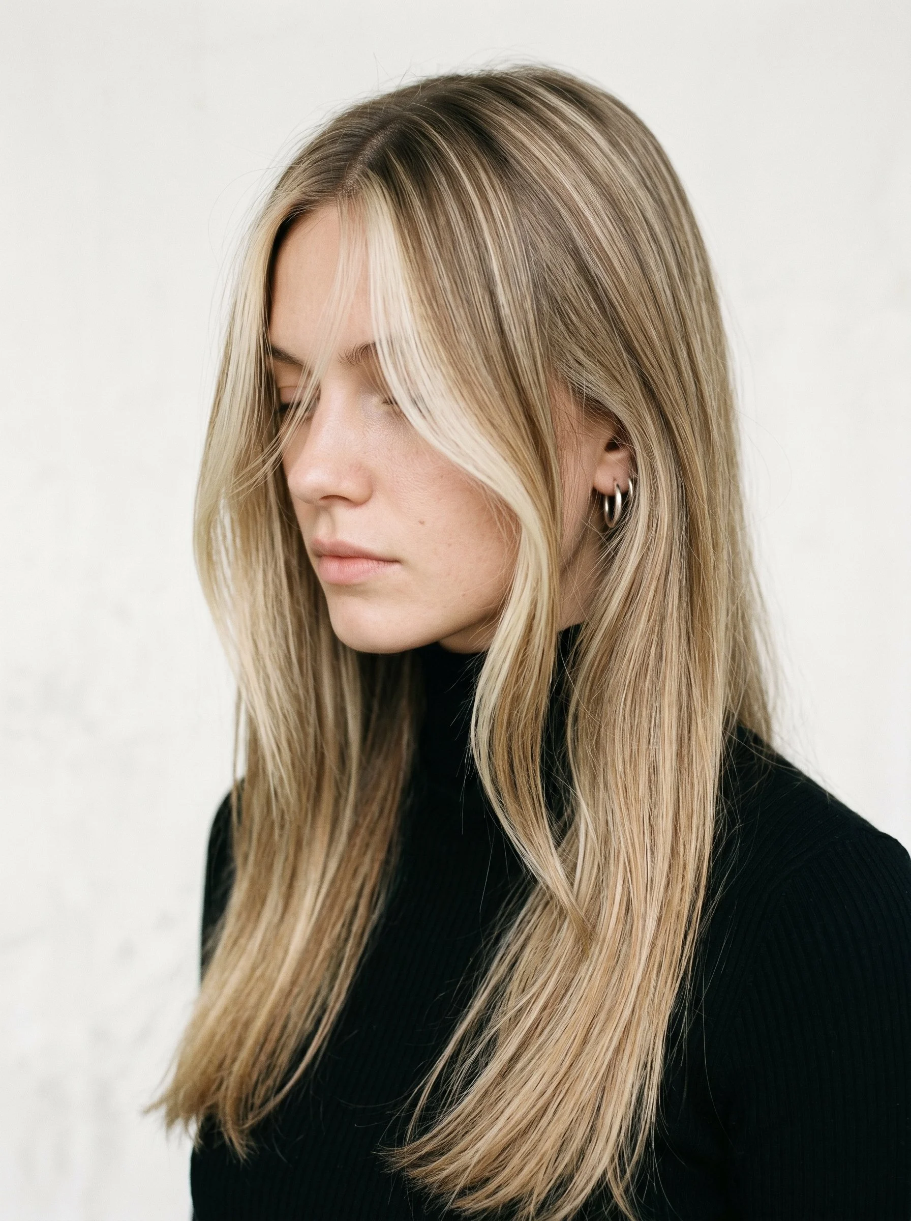 Long golden blonde hair with face-framing layers