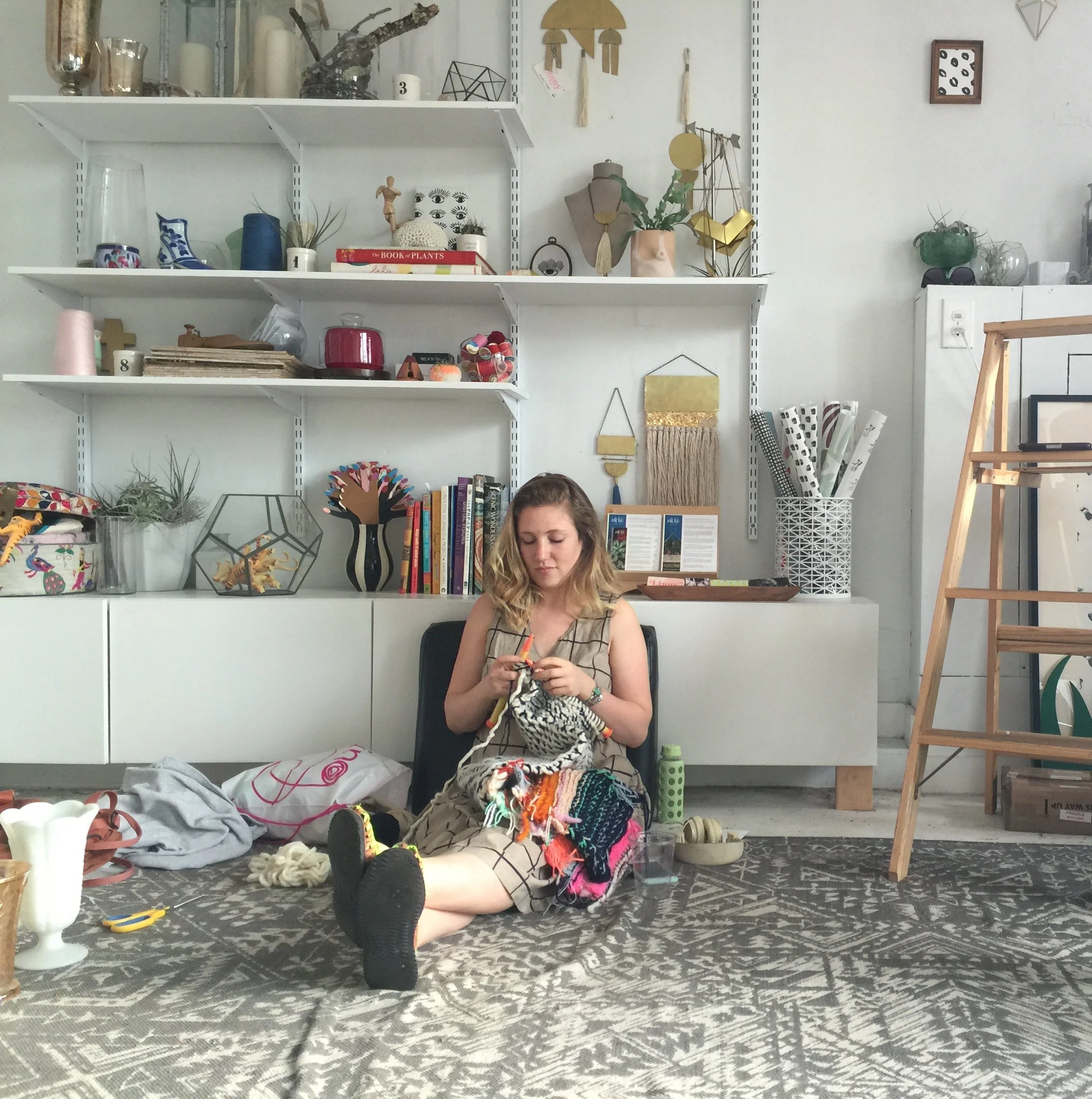 The artist designing the collection in the studio 
