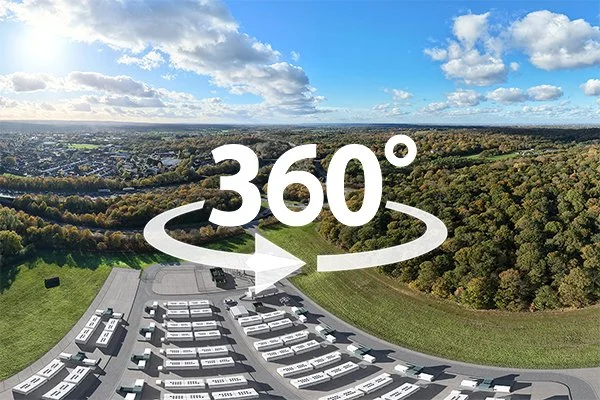 Aerial view trees and fields, with a large 360-degree rotation graphic overlay.