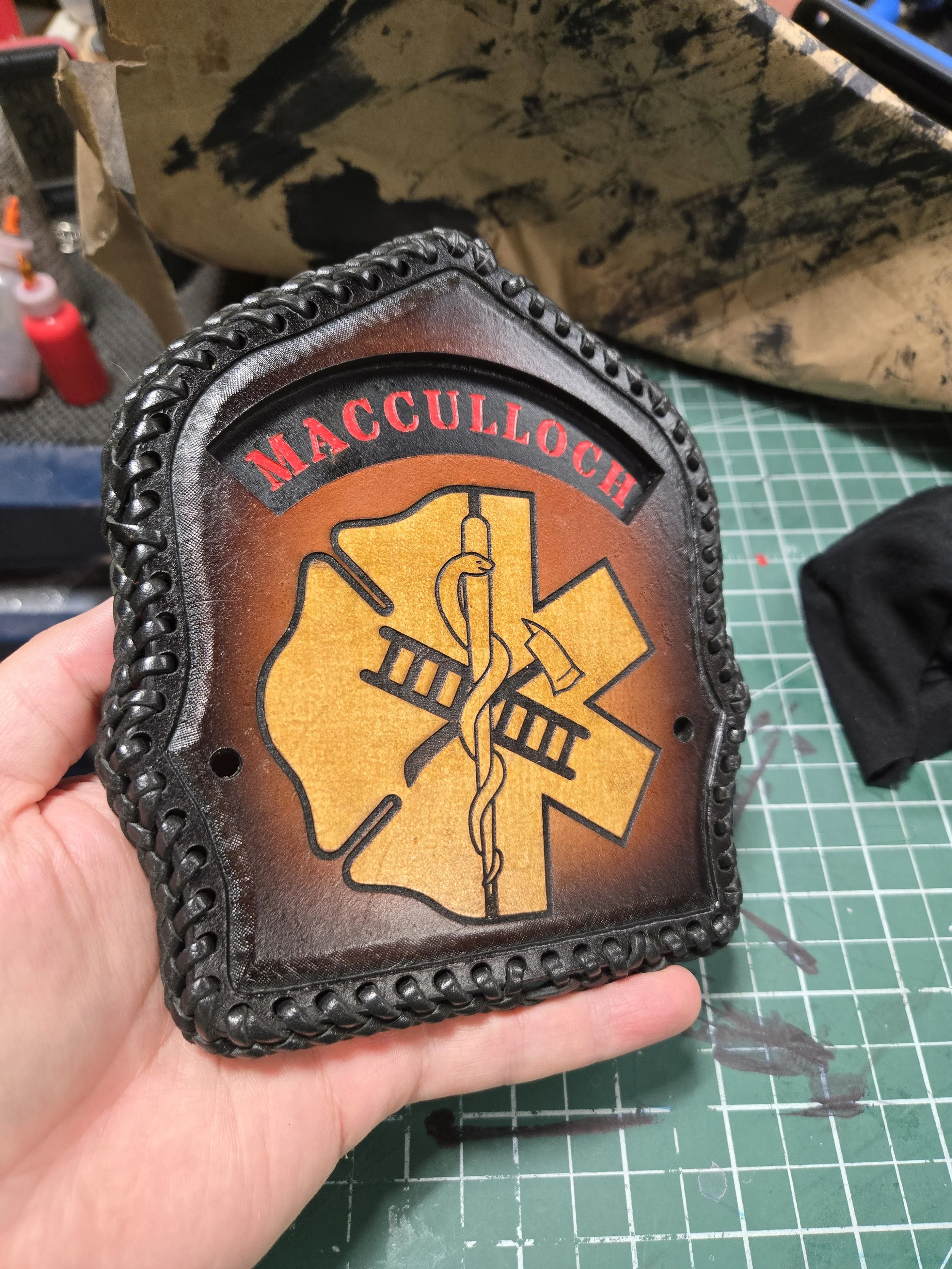 Custom handcrafted leather Fire / EMS piece by Awl Star Leather with personalized name and fire /medical emblem.