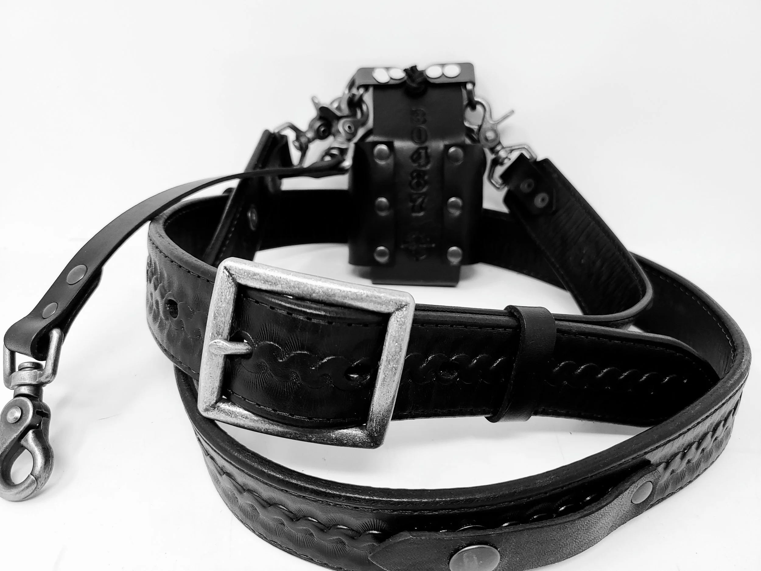 Awl Star Leather black leather radio harness with adjustable shoulder strap and radio basket.