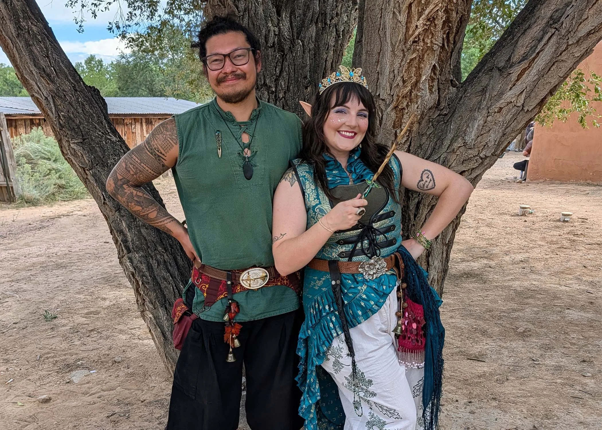 Irish folk duo Secret Moss Meadow performing in Celtic fantasy costumes at a Renaissance faire.