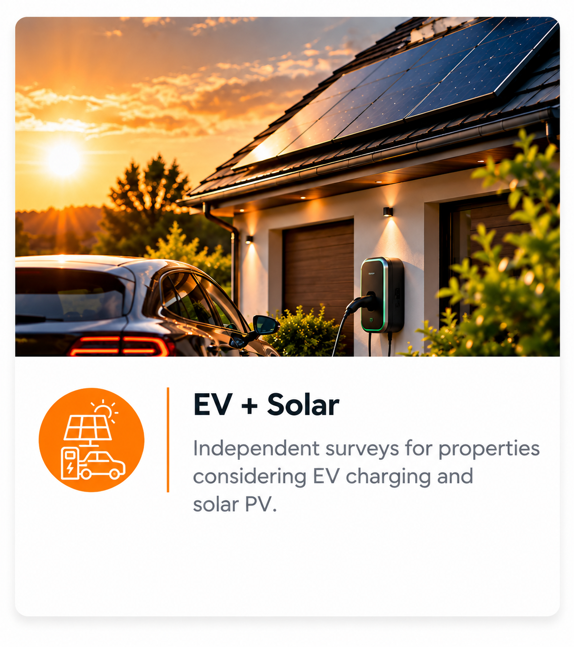 A house with solar panels on the roof, an electric vehicle charging station outside, and a car parked nearby at sunset.