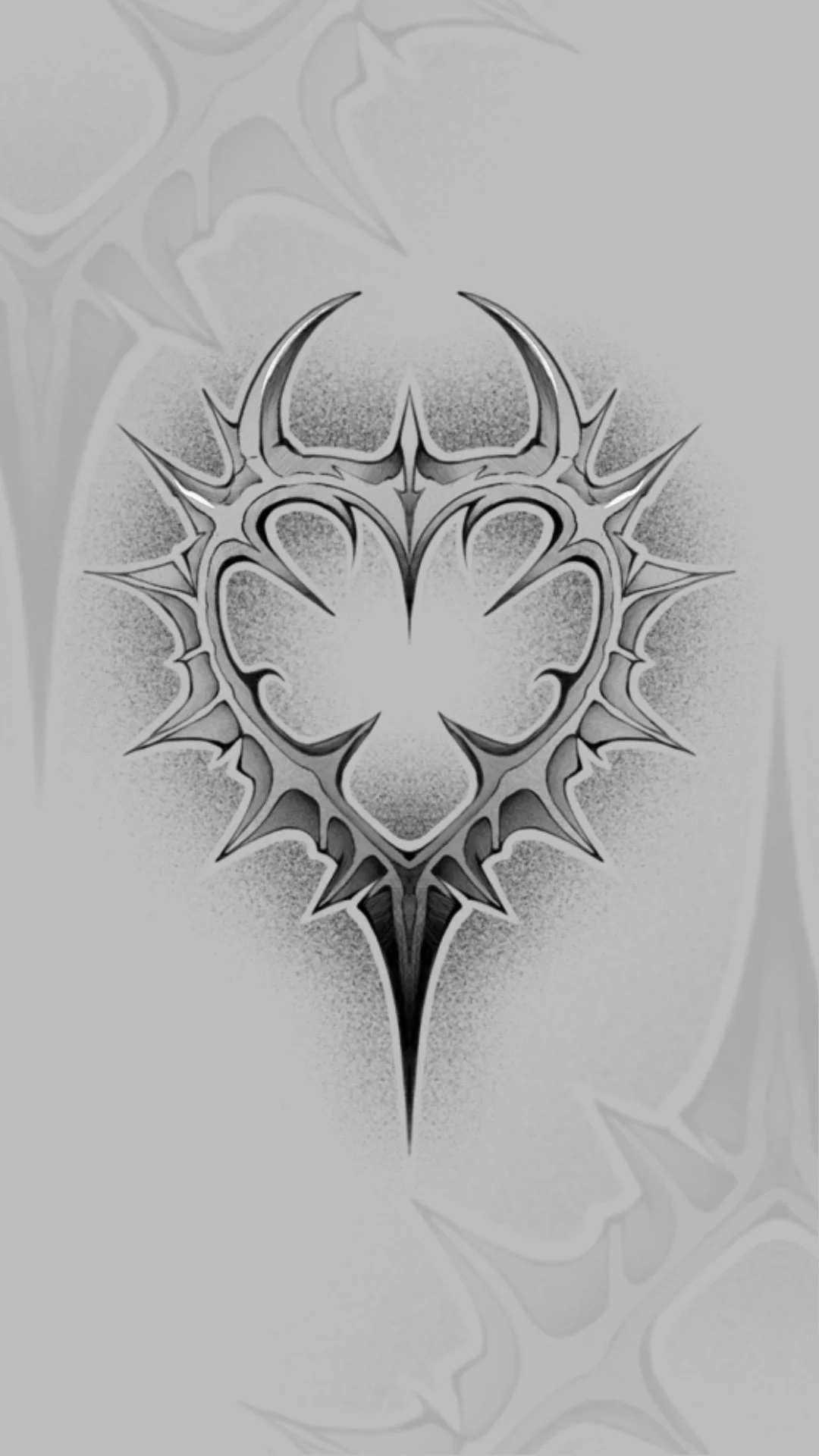 A stylized black and white tribal heart design with sharp, pointed edges and symmetrical patterns.