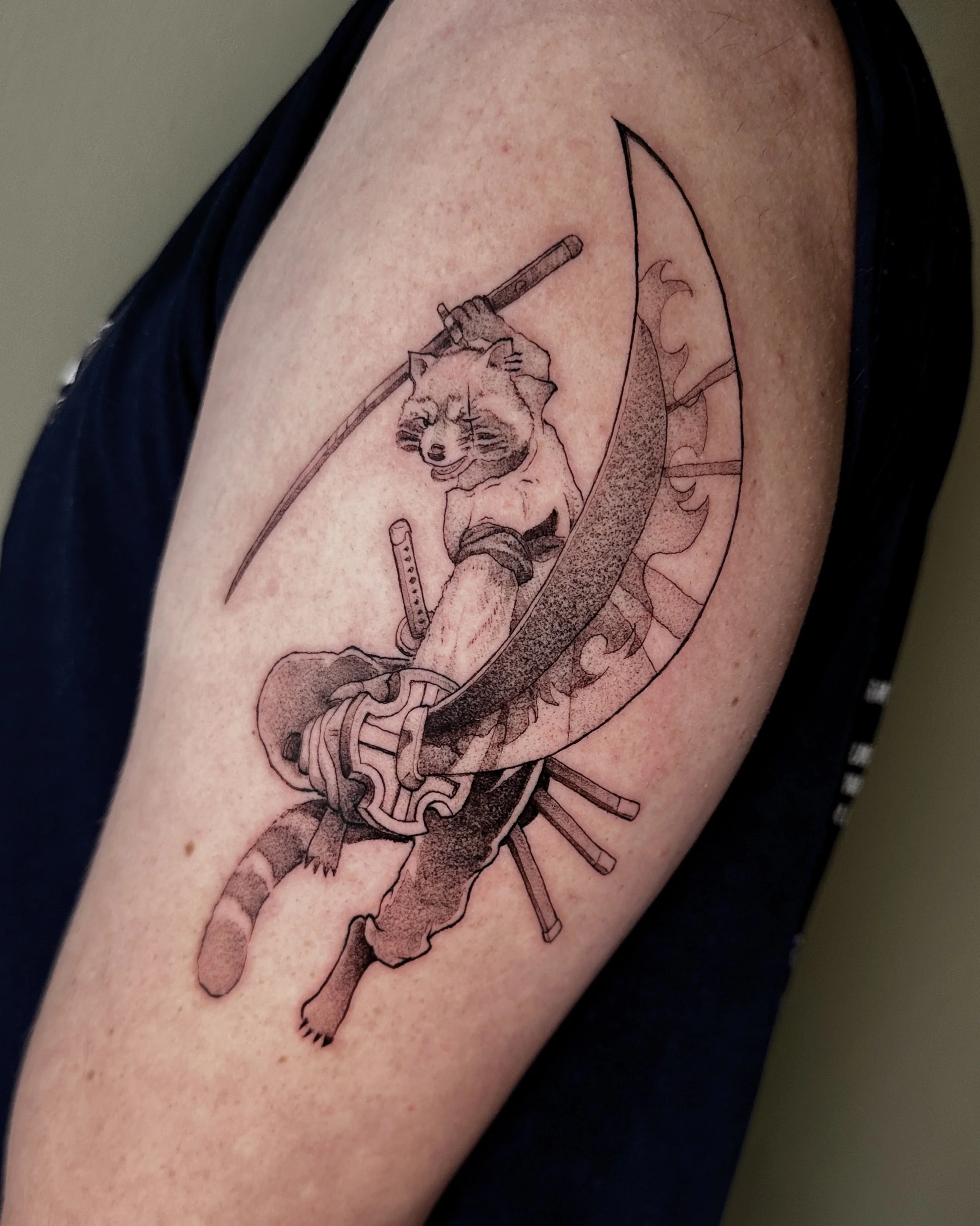 Tattoo of a raccoon holding a sword, with a katana sword and flames surrounding it, on a person's upper arm. its a raccoon version of Zoro from One Piece