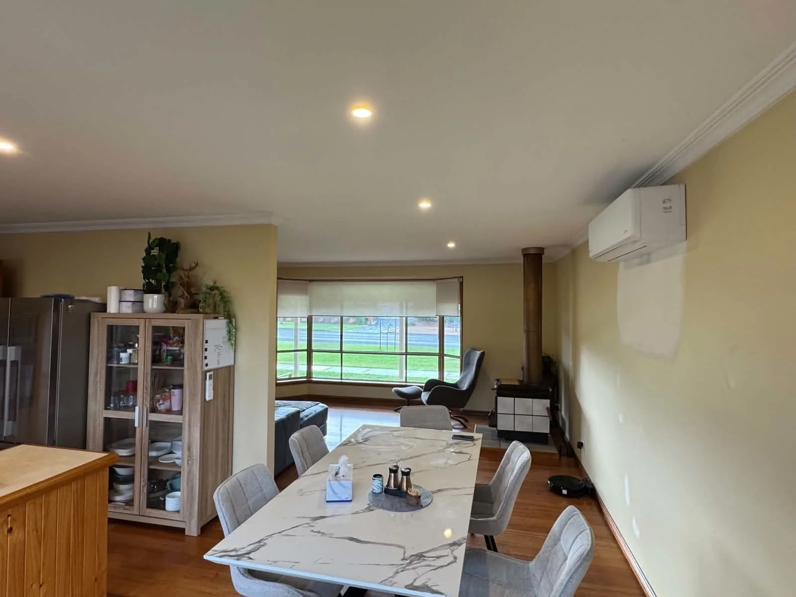 Living and dining room with new downlights and a split system