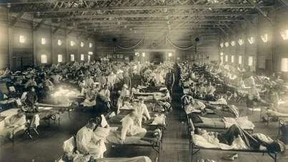 Camp Funston hospital, Kansas showing rows of camp beds with patients lying in them.