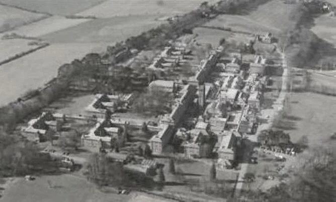 A black and white birds eye view of St Augustine's Hospital, Chartham, Kent demonstrating it's size as a self-contained village.