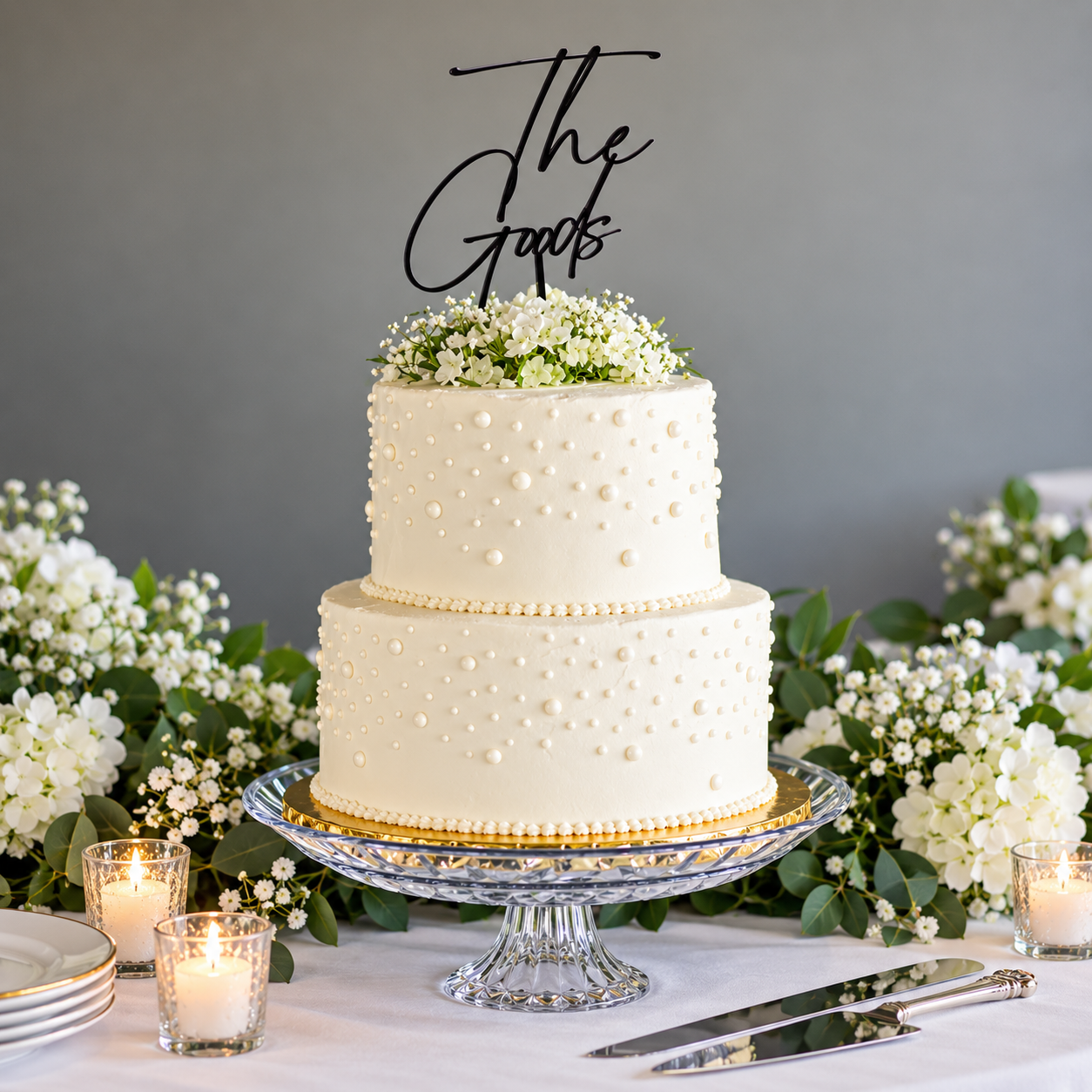 Elegant Pearl-Dotted Wedding Cake.png