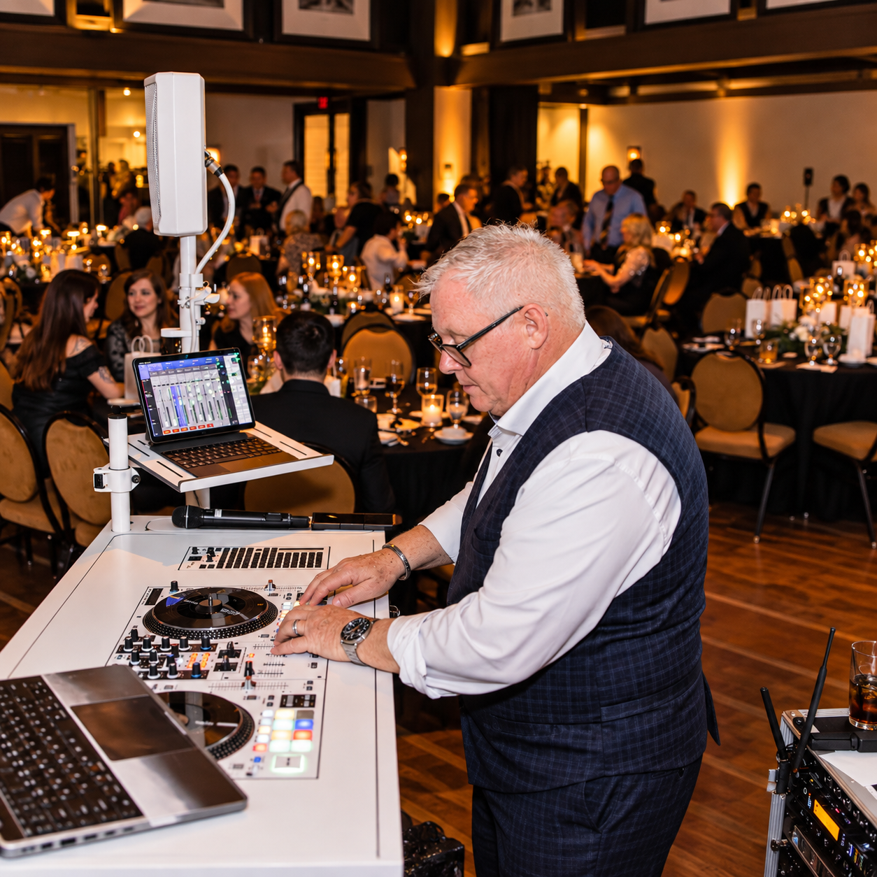 Elegant DJ at Candlelit Reception.png