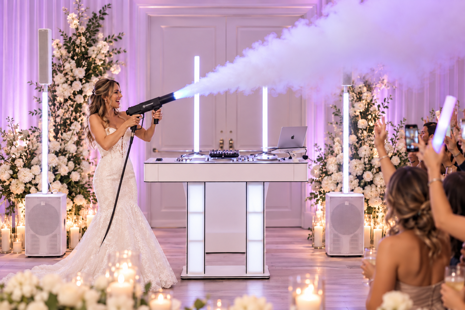 Bride firing a CO2 cannon over the dance floor in front of the NightBeat DJ booth and floral backdrop