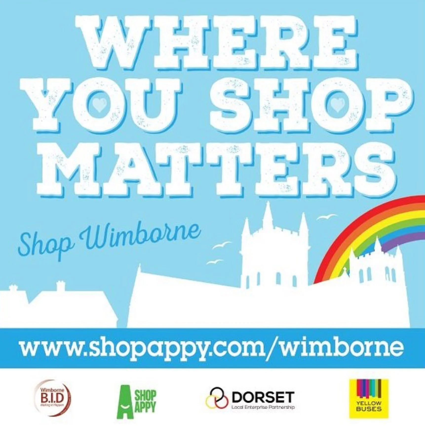 Promotional graphic for Wimbourne, featuring rainbow and castle silhouette, with the text 'Where You Shop Matters' and website URL www.shopappy.com/wimbourne. Contains logos for Wimbourne BID, Shop Happy, Dorset, and Yellow Buses.