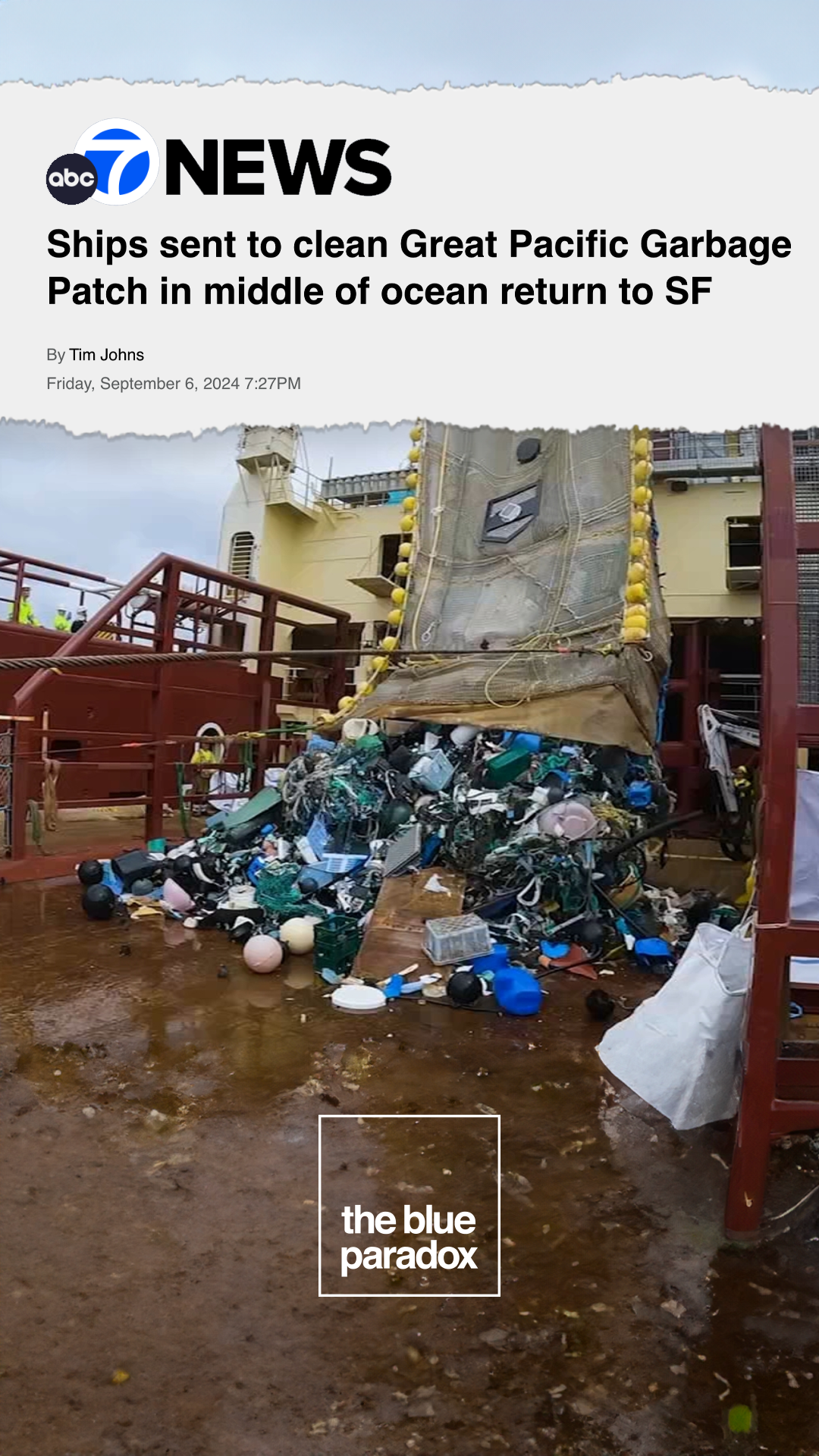 A ship's debris and garbage on a muddy surface, with a large net of trash hanging from the ship's side.